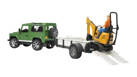 Land Rover with trailer and micro excavator